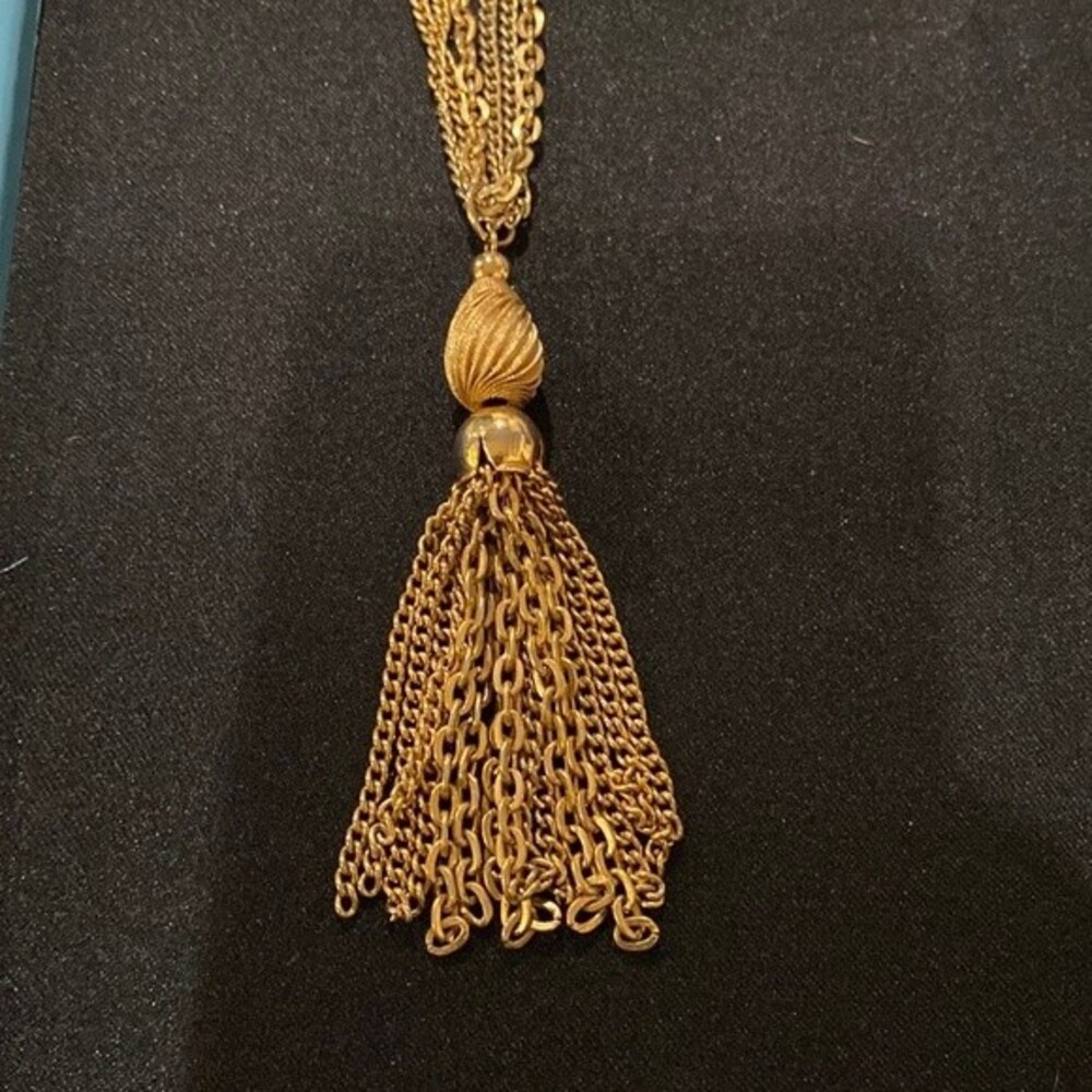 J12) Gold-tone tassel Pendant with 3 gold tone chains approximate 22” long chain